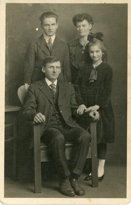 "Mr. and Mrs. Malcolm, Robbie and Mable" in Biggar, Saskatchewan