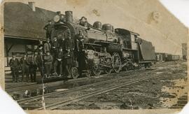 Group of Men on Grand Trunk Pacific Engine #1102 in Biggar, Saskatchewan