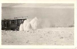 Trolley clearing snow