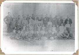 The pupils and teachers in the stone school in 1899