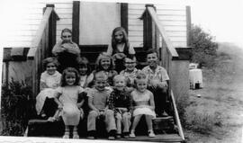 Welch family on steps of Lenwall School