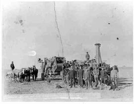 E.J. (Ted) Heath and Bonnar (Bonar) outfit threshing on farm of David Copeland