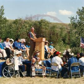 William Thomas Molloy at podium of official opening ceremony