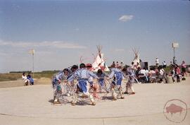 Group performing hoop dance in amphitheatre