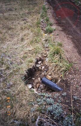 Road showing damage from water run-off