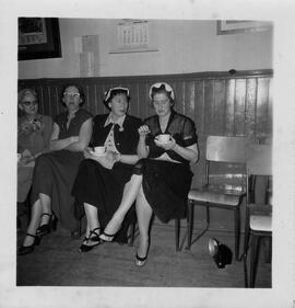 Four women drinking tea