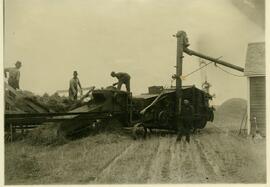 Threshing grain