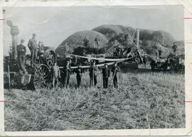 Threshing machine and crew