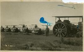 Hudson Brothers outfit cutting wheat