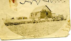 House banked with bales