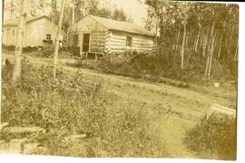 Wood hut in field