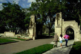 Individuals entering memorial gate